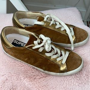 brown suede golden goose super-stars with gold accents